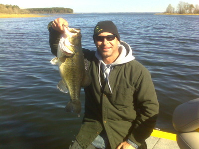 Big bass like this one often hit in the middle of the day in winter months. This one bite this happy clients soft plastic at 1 p.m.