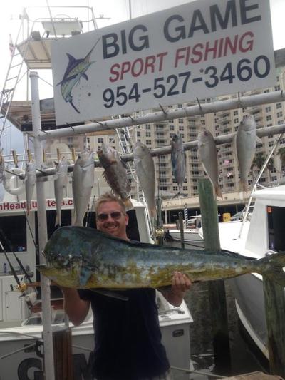 Bull dolphin at the dock with lots of tilefish