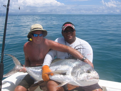 Casey McCartin shows off a 70+lb roosterfish. Roosters and snappers have been keeping anglers happy in August.