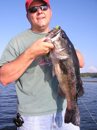 This happy customer, Jerry Hebert, connects with a big bass on Stanley's Ribbit frog