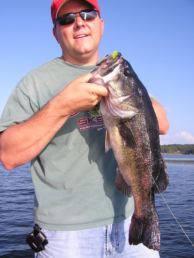 This happy customer, Jerry Hebert, connects with a big bass on Stanley's Ribbit frog
