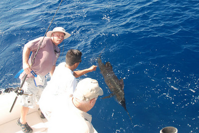 JOE HUCKEMEYER WITH SAIL