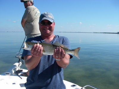 Jennys husband Bill shows off one of her trout