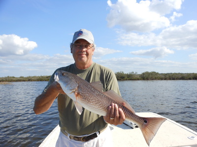 Bill with a big red fish