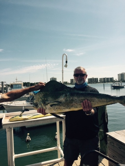 Jimbos first dolphin is a 40 pound bull.