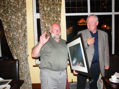 Mr John Halstad left being presented the top prize bu the Manager of WFDG Mr John Murphy