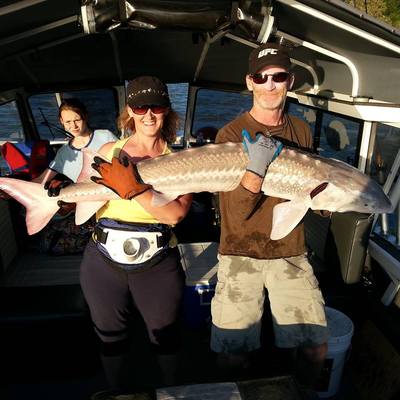 Mom and daughter holding a nice Sturgeon July 10th