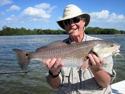 Keith McClintock, from Lake Forest, IL, with a red caught in the backcountry of Gasparilla Sound near Boca Grande on a CAL jig with a 4