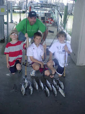 Family shot Birthday Man in the Red and white shirt