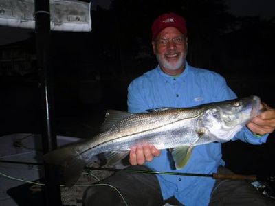 Lew Murray, from Tarpon Springs, FL, had good action catching and releasing snook on flies fishing dock lights before daylight while fishing with Capt. Rick Grassett.