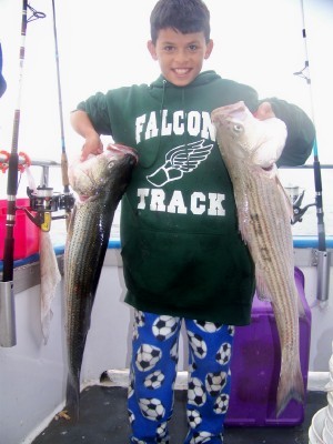9 year old Marques 2 of his 3 fish