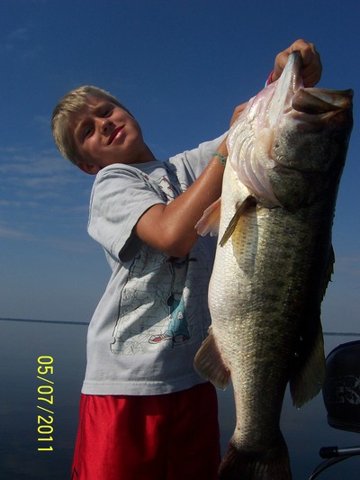 8 year old Curtis with 12 pound Toho Trophy Bass