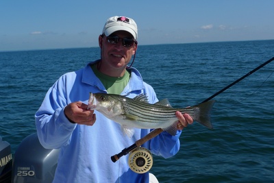 Michael with the first small Striper