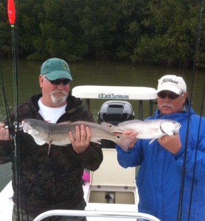 Mick and Shaun showing off a couple of redfish