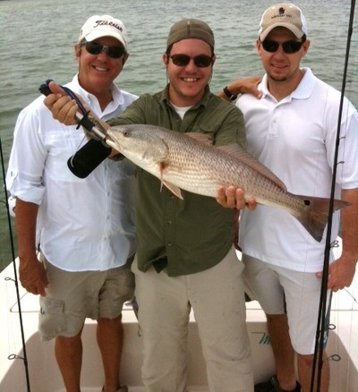 Mike, Adam and Tomas w/ Adam's 31 inch resfish