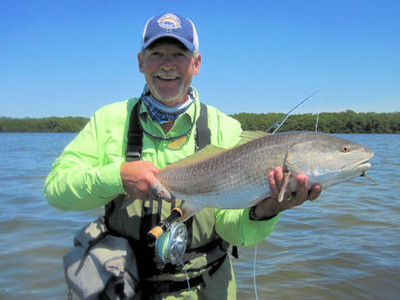 Mike Perez Sarasota Bay Clouser fly red caught and released with Capt. Rick Grassett