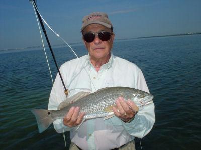 Fly angler Nick Reding, from Longboat Key, FL, caught and released this red on a pink Clouser while wading a Sarasota Bay sand bar with Capt. Rick Grassett.
