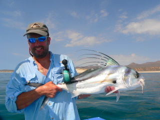 Russ Kudile showing off a Rooster fish