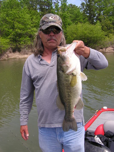 David Sisk, Ft Worth,Tx angler with a fine Rayburn bass caught on a weightless TX rigged soft plastic.