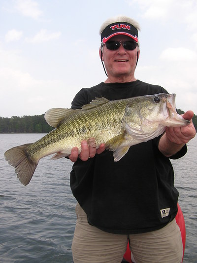 Mike Hamilton, Lafayette, LA angler, with a huge lunker caught in south Toledo's Mill Creek