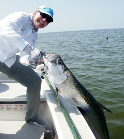 Sarah with her tarpon on the fly.