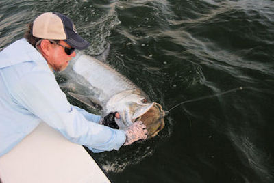 Capt. Rick Grassett with 115-lb Tampa Bay tarpon