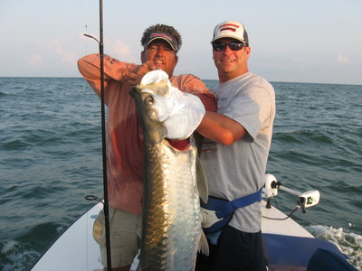 mark woolum with a 120lb tarpon