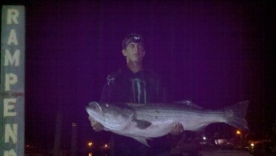 Austin with his 35 pounder, his largest bass to date.