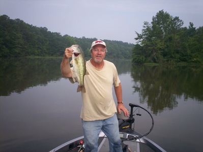 The Author, Reed Montgomery, with a nice Guntersville lake summertime bass!