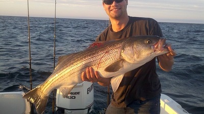 Sean with one of 31 keepers caught during a trip aboard the Miss Loretta.