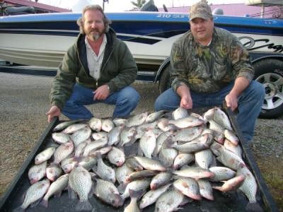 Here is a picture from 12/29/2007 with clients Keith Nelson and Kim Pritchett from Birmingham Alabama 65 keeper fish with a total of around 85 crappie caught...