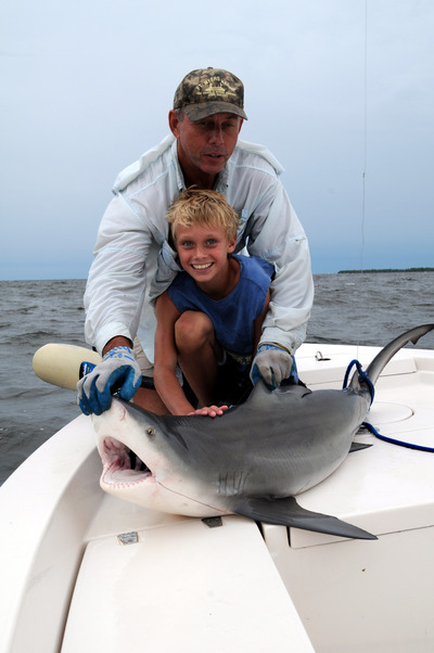 10 year old Domminick visiting from Canada with his first shark. A five foot Bull caught and released in northern Matlacha Pass.