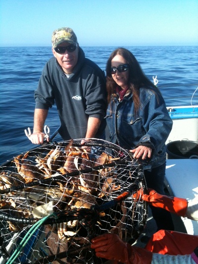 Don & Debbie of P Line with a full crab pot