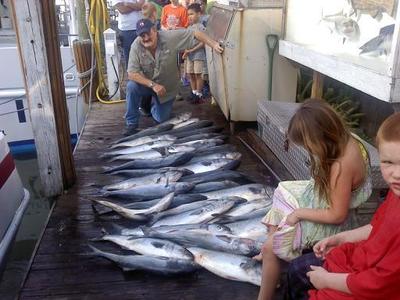 Capt Stu with a lot of bluefish