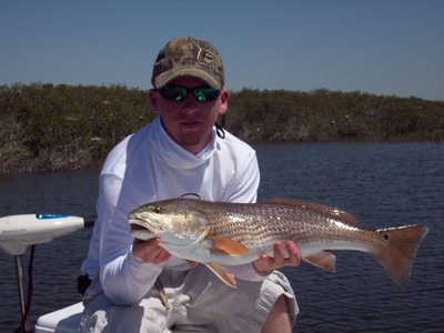 Nathan with a 28 inch redfish