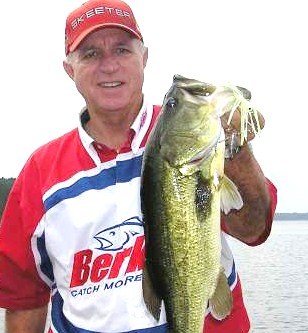 Author/guide puts a big Stanley spinnerbait bass in the boat.