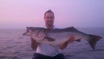 Kevin with one of his 16 keeper striped bass.  This one weighed in at 39 pounds.