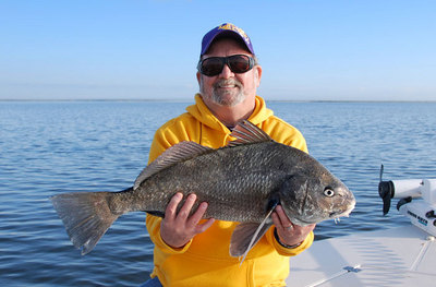 Lewis and his black drum