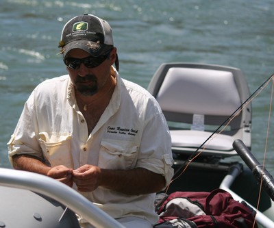 JB Klyap, tying on a hopper with his teeth