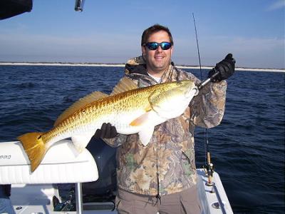 Mark hooked up with this big red on a Spro Buck Tail Jig