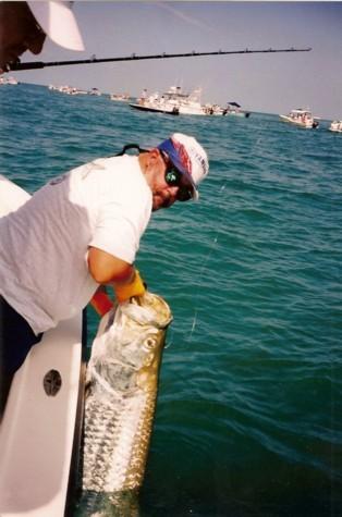 Capt. Tom and a nice Tarpon in the pass