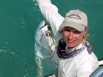 Michelle Barrette tired but still smiling after boating her largest tarpon to date.