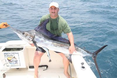 Fritz Weiss with his striped marlin, perfect Fathers Day/Birthdat present